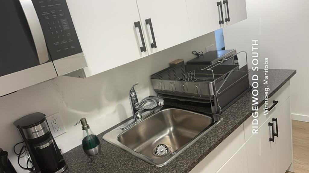 Guest Expertise Apartment วินนิเพก ภายนอก รูปภาพ